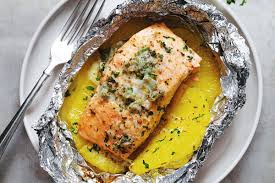 Place a salmon fillet, oiled side down, atop a sheet of foil. Garlic Lemon Butter Salmon In Foil With Pineapple Eatwell101