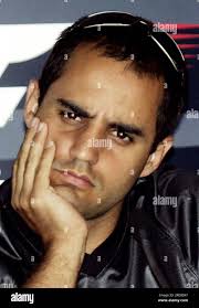 Formula One McLaren driver Juan Pablo Montoya of Colombia rests his head in  his hand during a press conference at the track in Melbourne, Australia,  Thursday, March 30, 2006. Melbourne will host