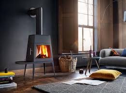 Modern wood stoves offer a place to recharge and relax. 6 Modern Takes On Wood Burning Stoves Architectural Digest