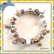 Pandora bracelet,silver,gold,rose gold peach blossom sliding charm bracelet with cz adjustable bracelet suitable any size for woman bracelet. Pandora Bracelet With Beautiful Two Tone Charms And A Hint Of White By Yasmeen Pandora Jewelry Pandora Bracelet Pandora Bracelets