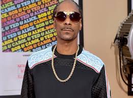 In august 1993, snoop dogg was arrested in connection with the death of phillip woldermarian, a member of a rival gang who was shot and killed by snoop's bodyguard, mckinley lee; Snoop Dogg S Grandson Kai Dies At 10 Days Old The Independent The Independent