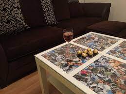 I used mod podge and wrapping paper to makeover the top. Decoupage Coffee Table Photo Collage Idea Does Mod Podge Dry Clear