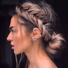 How to wear a messy bun with a hat 🧢 Gather your hair into a ponytail and  secure it with a hair tie. On the final pull through, create a half bun.