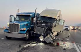 Semi trucks collide avoiding worker retrieving construction cones