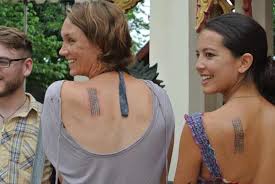 Travelers near and far seek his modern sak yants, or spiritual people from around the world travel to bangkok, thailand to see famed tattoo master ajarn noo kanpai. Tattooed In Thailand A Backpacker Rite Of Passage