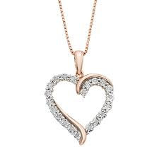 Make a statement with the sparkling heart collier necklace. 1 10 Carat T W Diamond 14k Rose Gold Vermeil Heart Pendant Necklace