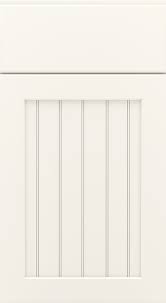 white beadboard cabinets in a laundry