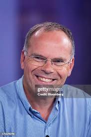 Mark Post, a Dutch scientist, poses for a photograph while holding... News  Photo