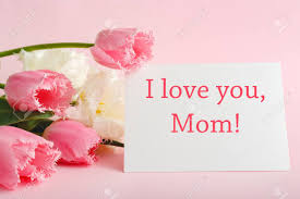 Purple flowers are regal and luxurious, and make stunning gifts for your mom, grandma, or mother in law. I Love You Mom Text On Gift Card In Flower Bouquet On Pink Background Greeting Card