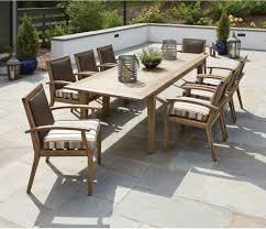 This Big Teak Outdoor Dining Set Includes The 110 Butterfly Leaf Umbrella Dining Table With 8 Dining A Wicker Dining Set Wicker Dining Tables Wicker Patio Set