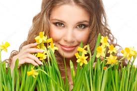 Girl and daffodils — Stock Photo © evarlamov #34695237