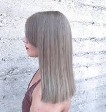 Ash pale blonde almost grey hair with orange red matte lipstick and super pale skin. 35 Charismatic Light And Dark Ash Blonde Hairstyles 2020