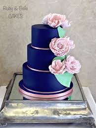 Navy Blue Wedding Cake With Pale Pink Flowers Created By Ruby Belle Cakes Brighton Uk Wedding Cake Fresh Flowers Cool Wedding Cakes Wedding Cakes Vintage