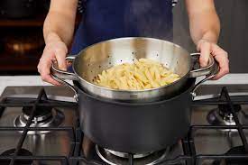 Pour pasta into boiling water. How To Cook Pasta A Step By Step Guide Features Jamie Oliver