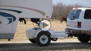 Since a tow vehicle and wheeled cargo may not gooseneck hitches work differently as compared to a standard or regular hitch. Tow All Dolly Roy Wall Is The Man Who Invented The Tow All Dolly The Most Technologically Advanced Towing Sys Horse Trailer Gooseneck Trailer Camping Trailer