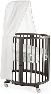 Stokke Sleepi Hazy Grey Adjustable Oval Mini Baby Crib Bundle With Mattress Baby Bassinet Babybassinet Toddlerb Best Baby Cribs Round Baby Cribs Baby Cribs