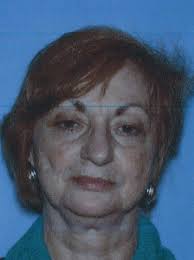 Woman, 70, accused of abusing her great-grandchildren turns herself in