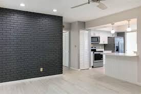 The paint color of the gallery wall is glidden black mica. Black Accent Wall Design Ideas Designing Idea