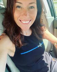 Hey there! Waiting in the school pick up line in one of the favorite tanks  we offer. 🗣 Did you know we offer this design without the “Wife” to make  it more