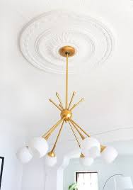 Ceiling medallion for your chandelier at discount prices. How To Center A Light Fixture Using A Ceiling Medallion Francois Et Moi Ceiling Medallions Dining Room Ceiling Dining Room Light Fixtures