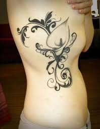 Rib tattoos are extremely popular and you can get designs from a small quote to elaborate pictures. 25 Rib Tattoo Ideas For Girls Designbump