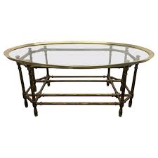 Use it to add a touch of contemporary flair to a traditional space or to simply complete a modern aesthetic. Faux Bamboo And Brass Coffee Table By Baker Furniture Company For Sale At 1stdibs