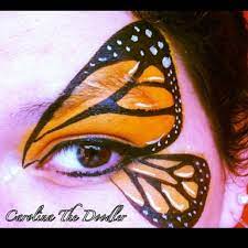 A Monarch Butterfly Face Painting Eye Design By Carolina The Doodler Face Painting Butterfly Face Face Painting Designs