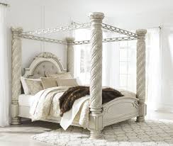 Cassimore North Shore Pearl Silver King Upholstered Poster Canopy Bed From Ashley Coleman Furniture King Size Canopy Bed Canopy Bedroom Sets Canopy Bedroom