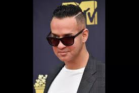 Gym, Tan, Laundry, Book Signing…Mike The Situation hits the road