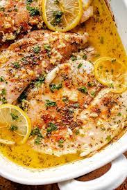 Easy Garlic Butter Oven Baked Tilapia Seasoned With A Classic Blend Of Lemon Garlic Melted But Tilapia Recipes Easy Fish Dinner Recipes Baked Tilapia Recipes