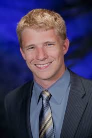 Photo Release -- Dane Smith Promoted to Corporate Treasurer