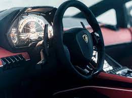 The new countach translates that unconventional and edgy character into the future, says head of this deep red leather interior perfectly highlights the cream colored exterior. 59clyqxg8qs32m