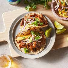 Chicken Mole Tacos With Mango Jicama Slaw Recipe Jicama Slaw Chicken Mole Eating Well Recipes
