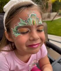 Kate's Face painting added a new...