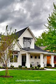 The Heartland Combining Multiple Materials With The Brick And Board And Batten All Painted Painted Brick Exteriors Colonial House Exteriors Colonial Exterior