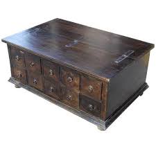 I am working on building new furniture pieces for my measure and mark the center of the coffee table and install the center support by driving 1 1/4″ wood screws into the 1×2 uprights from the underside of. Classic Wood Storage Coffee Table With 10 Drawers