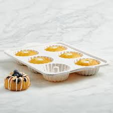 Structure silicone is dishwasher safe and is resistant to thermal shock, allowing it to transport safely from freezer to oven. Trudeau Crave Silicone 6 Ct Mini Fluted Cake Pan Multicolor Confetti Walmart Com Walmart Com