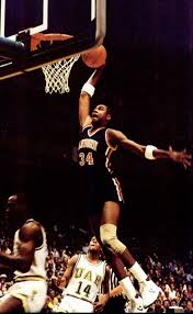Casual portrait of auburn charles barkley and teammate chuck person eating pizza during photo shoot. Charles Barkley 86 Auburn Alumni Association