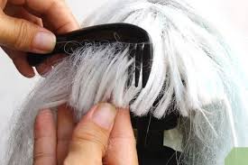 To make washing the hair easier, take a wire doll brush and run it through the hair starting at the ends. How To Untangle A Wig 10 Steps With Pictures Wikihow