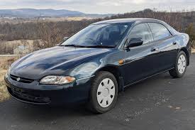Image result for Platinum Opal 1995 Mazda