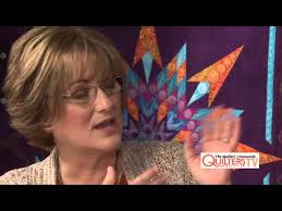 411 Linda V Taylor with Kimmy Brunner. Kimmy shows C curl border design.