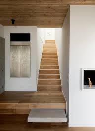The wall of the toilet is divided into two parts. Concrete Box House Influenced By Japanese Design