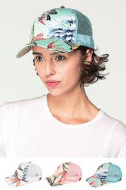 We extract distinct design elements, reimagine them into patterns for textile, and have them printed and sewn into statement hats. Tropical Flower Cc Trucker Hat