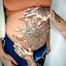 Belly henna typically fades quicker because the skin is thinner around the stomach and the stain does not penetrate as deeply as it does on the hands and feet. Pin On Pregnancy Henna Designs