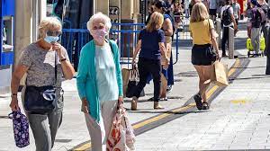 Pedestrians walk past a sign warning members of the public about the spread of coronavirus in hounslow, west london, on june 1. Beubfbmy4w4uqm