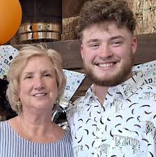 What is this plant, possibly bittersweet, in my berry patch?