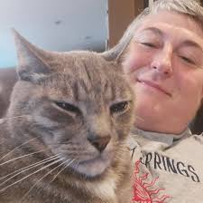 Tom is still not home. $100 reward Tom is a large grey tabby with green  eyes. He is a large cat, weighing between 16 and 18 lbs. He has a clipped  left