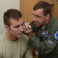 From left) Senior Airman James Kopp and Senior Airman