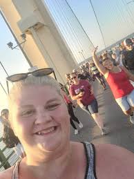 Locals walking the bike trail bridge