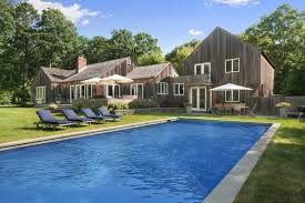 We are one of the very few companies who still make all parts of trampolines in the usa. Modern Farmhouse Boasts In Ground Trampoline Fun Curbed Hamptons